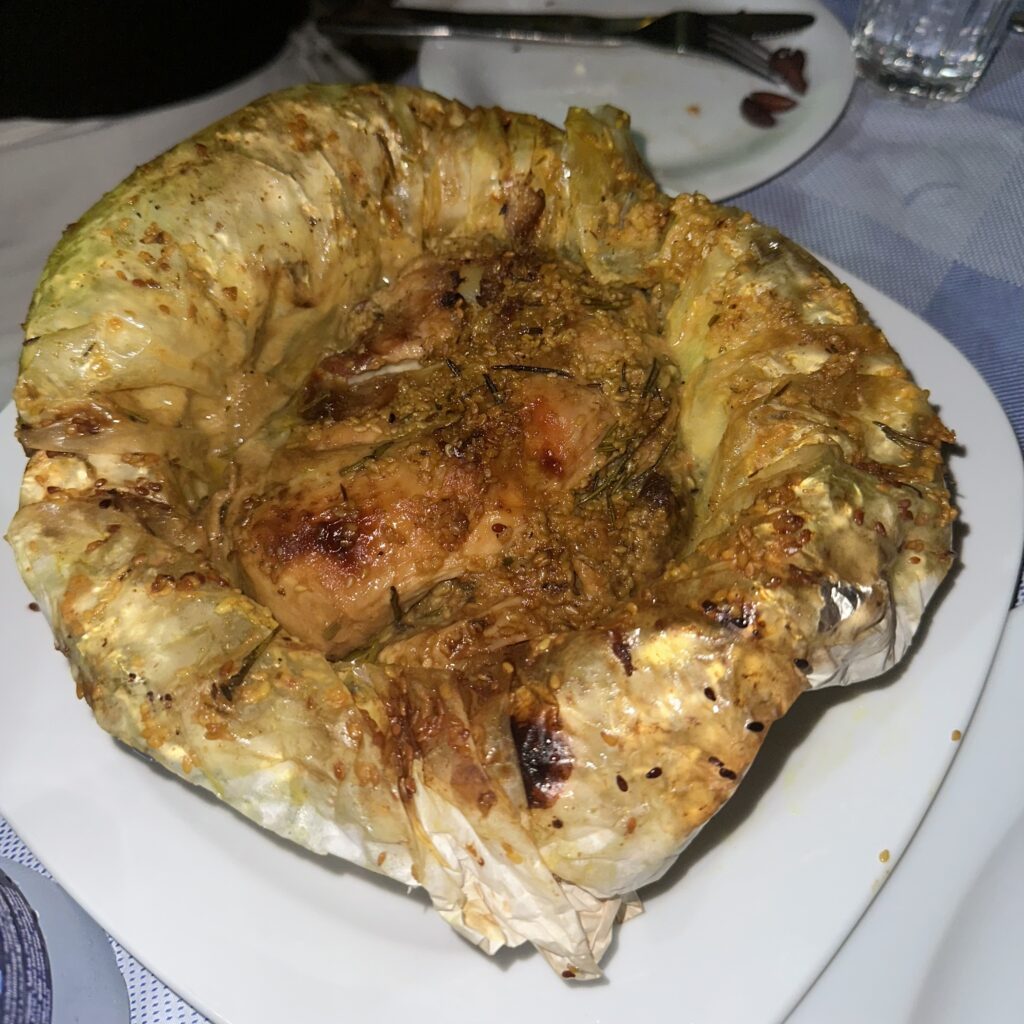 Chicken in paper at Methismeni Politia, Milos.